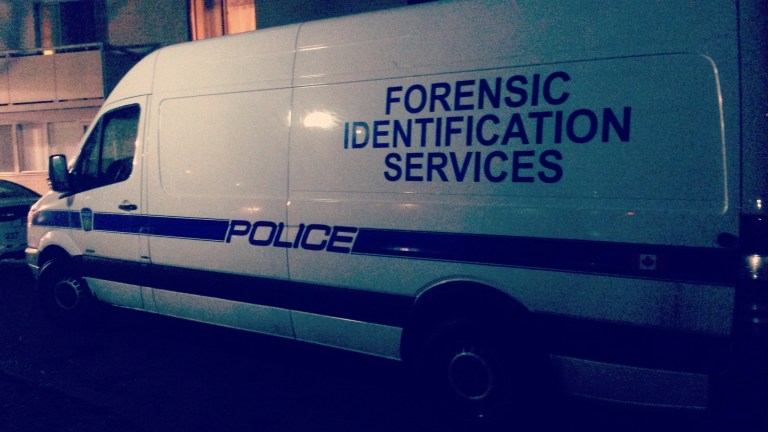 A boy was killed at 2177 Sherobee Rd. and a woman is in custody on Dec. 14, 2015. (Photo: Kelly Roche/QEW South Post)