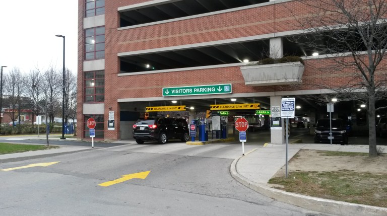 A vehicle enters the parking garage at Trillium's Queensway campus in south Mississauga. (Photo: Kelly Roche/QEW South Post)